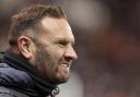 Ian Evatt looks on from the touchline at Blackpool during the penalty shootout