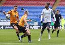 Bolton Wanderers' Paris Maghoma passes the ball to set up the second goal scored by Aaron Collins