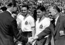 Prince Philip meets Bolton Wanderers players Ray Parry, Tommy Banks and team manager Bill Ridding, before the 2-0 victory over Manchester United in the 1958 FA Cup Final