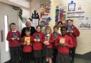 Schoolreader Dave McGee with the children he reads with