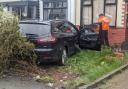 Car crashes into Farnworth house with police at scene