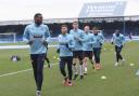 Bolton Wanderers' players warm up for their game at Peterborough United last season
