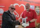 Dave Morgan  with member of British Heart Foundation. Picture by Julia Uttley