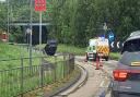 Car overturned at roundabout on the A58