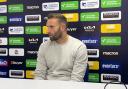Wanderers boss Ian Evatt speaks to the media
