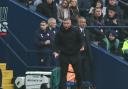 Bolton Wanderers manager Steven Schumacher shouts instructions to his team from the technical area
