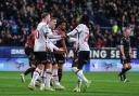 Bolton Wanderers' Marcus Forss celebrates scoring his side's third goal