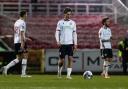 Eoin Toal , Joel Randall and Josh Sheehan look sheepish after the FA Cup defeat at Swindon Town