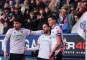 Josh Sheehan celebrates a goal against Rotherham on Friday with Max Conway and Eoin Toal