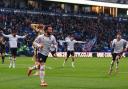 Bolton Wanderers' Josh Sheehan celebrates scoring the opening goal .