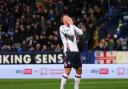 Bolton Wanderers' Sam Dalby reacts after his shot is saved