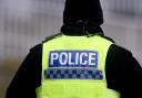 A boy was injured after a fight outside a row of shops in the Bradford district