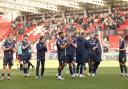 Bolton Wanderers players applaud the travelling fans at the final whistle