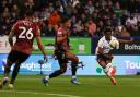 Bolton Wanderers' Amario Cozier-Duberry scores the opening goal