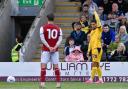 Ruben Rodrigues prepares to take a free kick against Fleetwood Town
