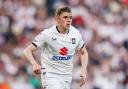 Max Dean - pictured here playing for MK Dons in 2024 - is keen to move back to England from Belgium