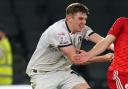 Max Dean playing for MK Dons in 2024
