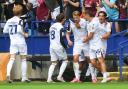 Bolton Wanderers' Sam Dalby is congratulated on scoring his team’s first goal