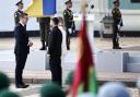 Ukrainian President Volodymyr Zelensky and his wife Olena Zelenska greet Prime Minister Andy Burnham (left) as he attends a commemorative ceremony marking Ukraine's 35th Independence Day outside St.