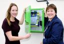 Judith Kelly and pub manager Rebecca Dale with the defibrillator