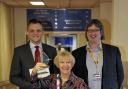 Enid Dunn with her award after inventing special bags for breast cancer patients, she is pictured with, left, Sponsor Mark Cherry from GoToJobBoard and right, Sandy Wilkie from Bolton NHS Hospital