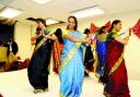 Dancers enjoy the festivities at the Veda Mandir Temple