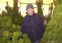 FESTIVE FINALE: John Holme at his Christmas tree stall in Bolton Market in Ashburner Street