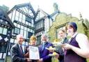 FLASHBACK: Staff at Turton Tower receive the Taste Lancashire Quality Assured award last summer