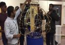 PREPARATIONS: Members of the community get busy building the Ravana