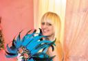 Feather mask at £13.99, blue prom dress at £39.99, lace gloves at £9.99, and