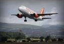 An Easyjet plane takes off from Glasgow Airport..