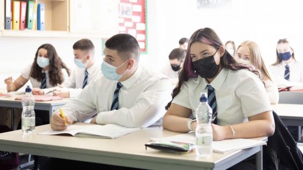 The Bolton News: Face masks are required to be worn in secondary schools now (PA)