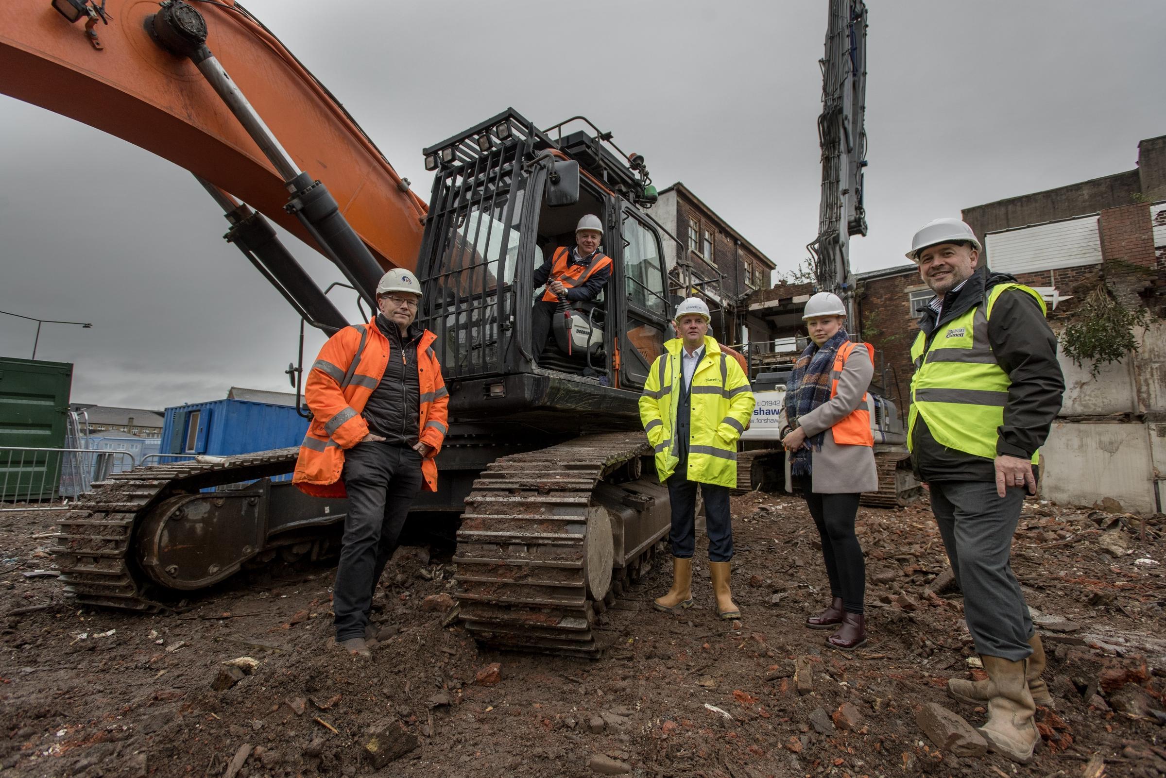 Demolition work continues on the new Central Street housing development off Deansgate, Bolton. Picture by Paul Heyes, Tuesday October 26, 2021.Chris Forshaw (Forshaw Demolition), Cllr Martyn Cox, Darran Lawless, Cllr Adele Warren, Paul Whittingham