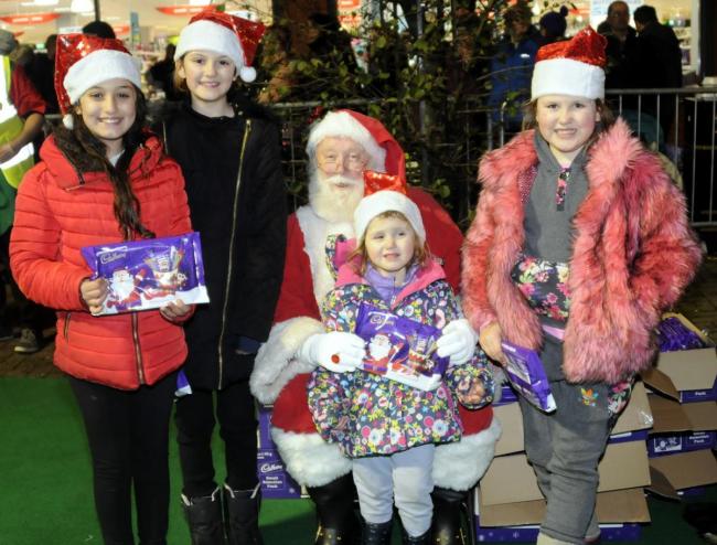 FLASHBACK: Santa meets visitors to the Farnworth Christmas Lights Switch On in 2018