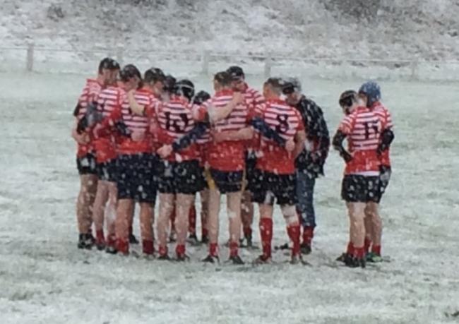 SNOW JOKE: Bolton Colts in the wintry conditions at Widnes