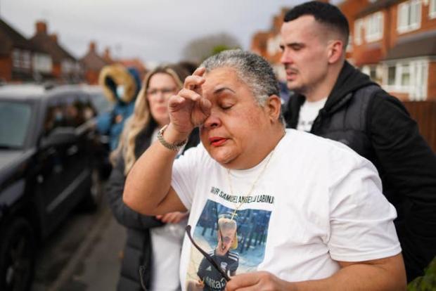 The Bolton News: Madeleine Halcrow was among a large crowd of people at a vigil (Jacob King/PA)