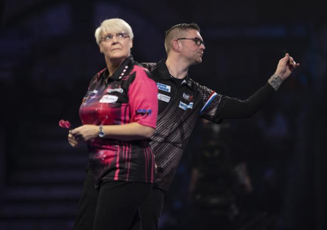 DISAPPOINTMENT: Bolton’s Lisa Ashton in action against Ron Meulenkamp. Picture by Lawrence Lustig/PDC