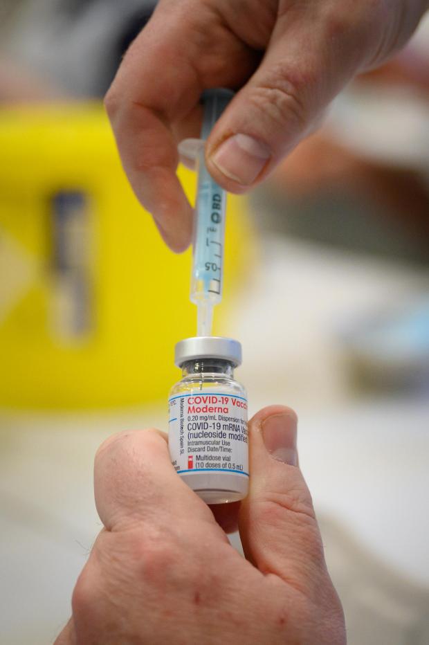 The Bolton News: A Covid vaccine being prepared. Credit: PA