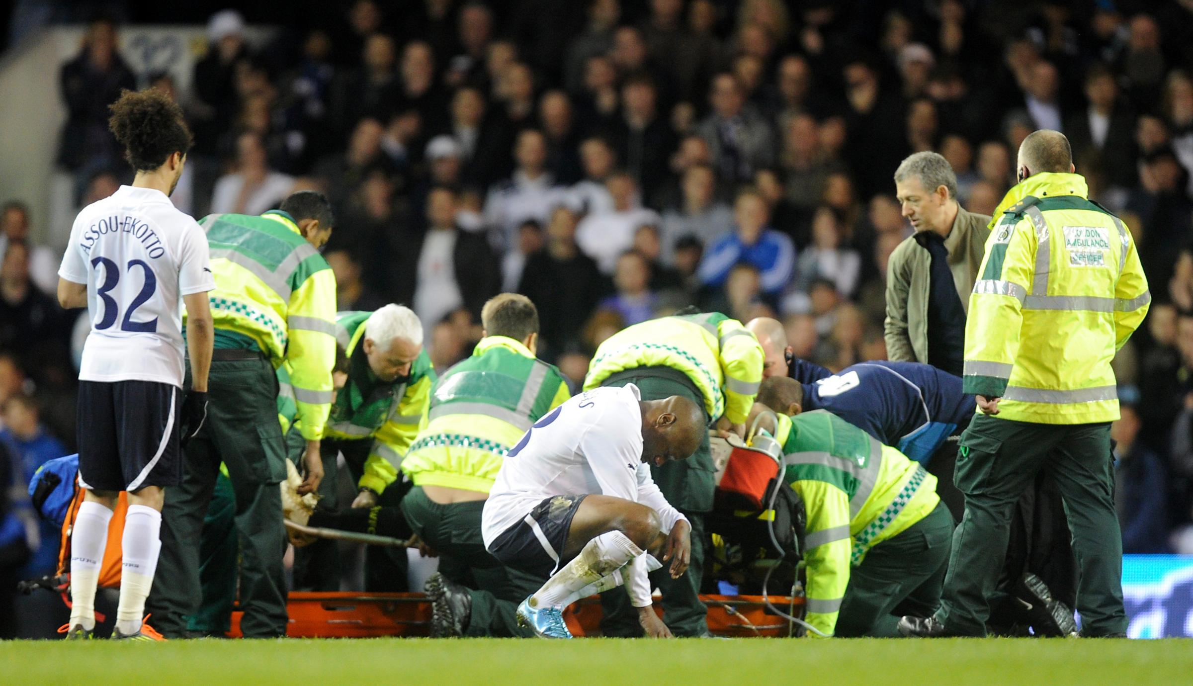 PA photo of medics, Tottenham players and Dr Andew Deaner surrounding Fabrice Muamba after he collapsed on the pitch at White Hart Lane. See PA Feature WELLBEING Fabrice Muamba. Picture credit should read: Rebecca Naden/PA. WARNING: This picture must