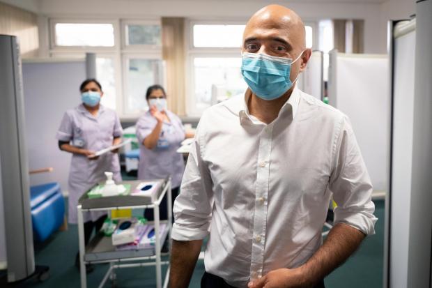 The Bolton News: Health secretary, Sajid Javid visits St George's Hospital in south west London where he talked to staff and met Covid 19 patients who are being treated with a new anti-viral drug. Photo via PA.