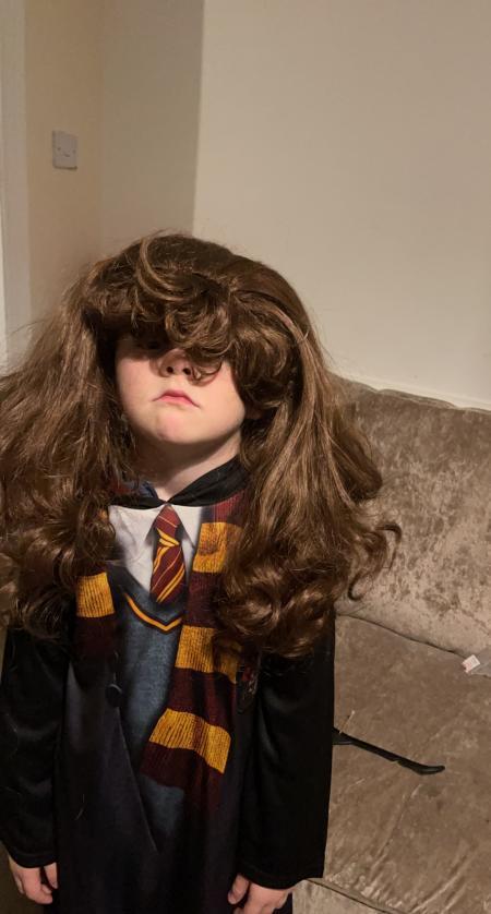 Noah Halligan being a good sport with his Hermione Granger costume
