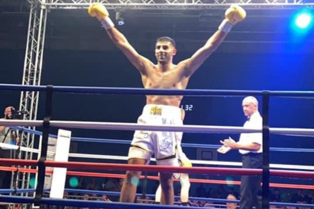 WINNING RUN: Bolton boxer Khaleel Majid