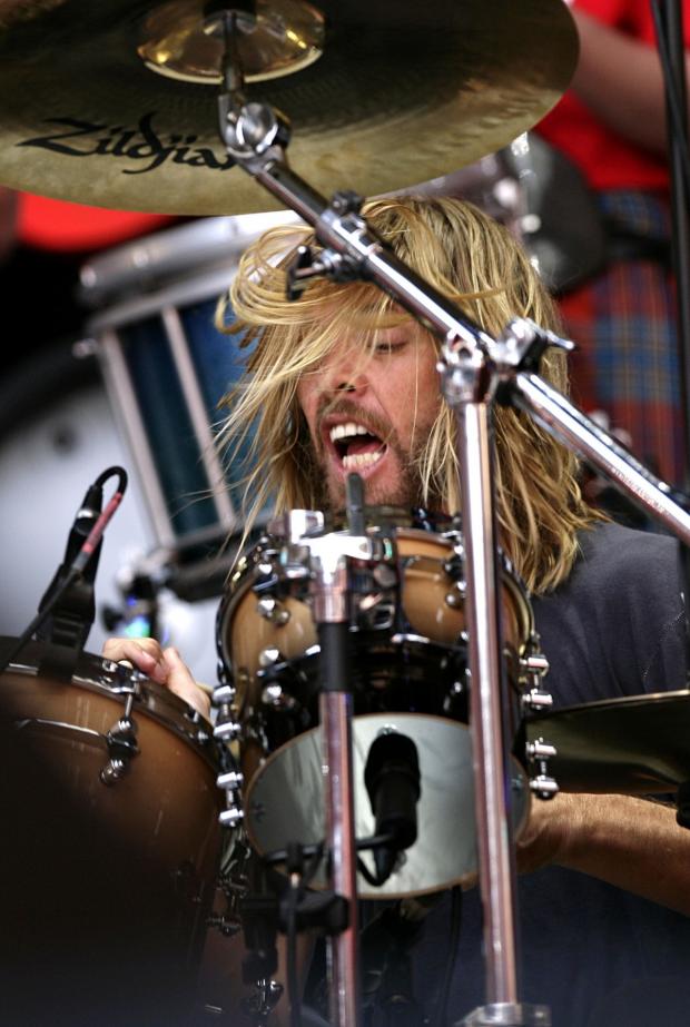 The Bolton News: Taylor Hawkins performs during the Live Earth charity concert at Wembley Stadium, London (PA)