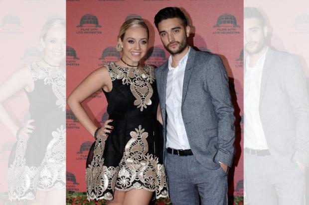 The Bolton News: Tom Parker and Kelsey Hardwick arrive at Jurassic Park live at the Royal Albert Hall in London.