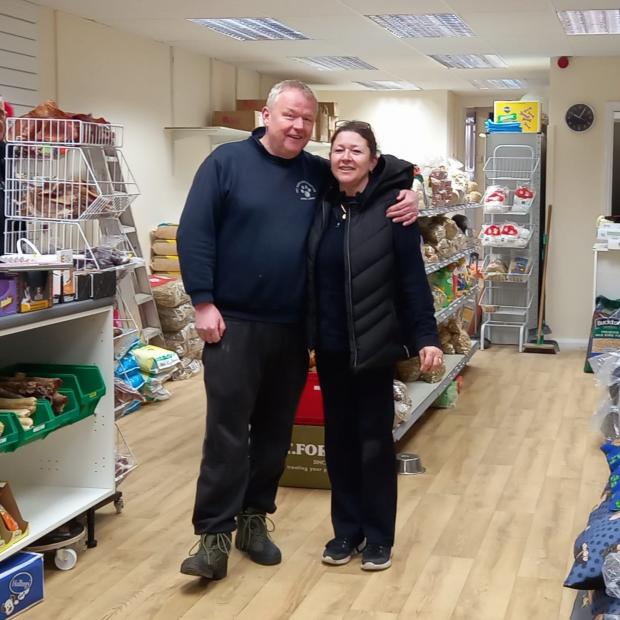 The Bolton News: Owner of previous pet shop, Nigel Cain, and Suzanne. Photo: Paul Sanders