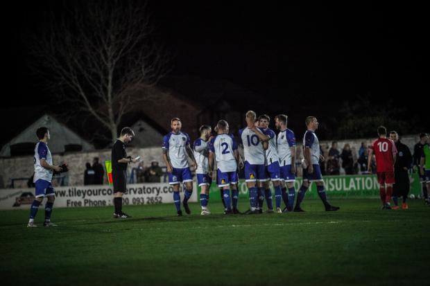 OUT: Bury AFC players look dejected after their cup defeat to Padiham Picture: Jake Horrocks