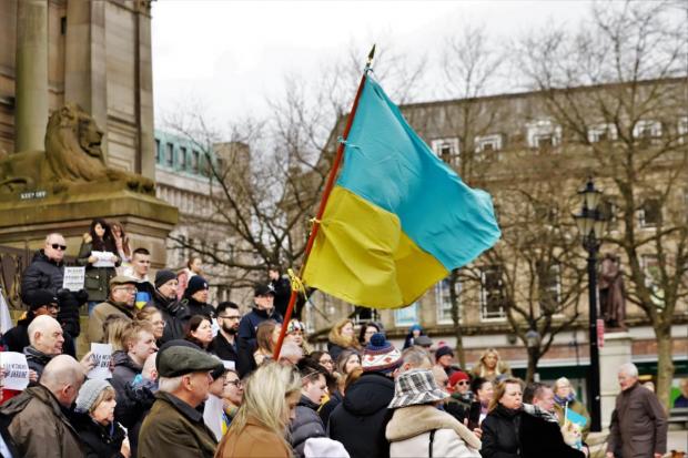 The Bolton News: Credit Henry Lisowski. People stand in solidarity for the people of Ukraine in Victoria Square