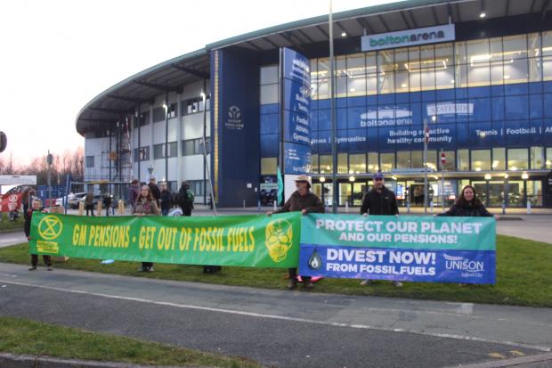 The Bolton News: Protestors gathered outside Bolton Arena on March 23 this year. Credit: Friends of the Earth Manchester