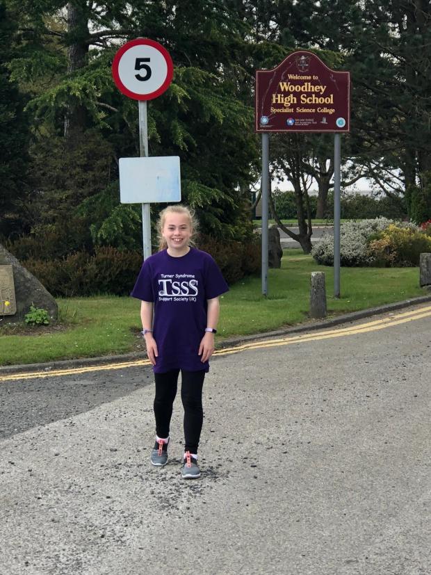 The Bolton News: Lily outside her school in Ramsbottom 