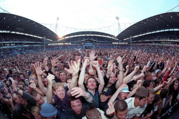 Fans at one of the two nights Oasis played at the Reebok in 2000